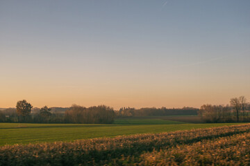 Obraz premium sunrise over the field landscape