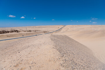 The highway going through the Yadan landform in Gobi, China National Highway 315