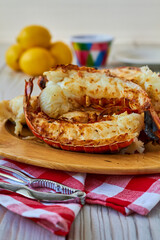 broiled rock lobster tails served with butter and fresh lemon juice