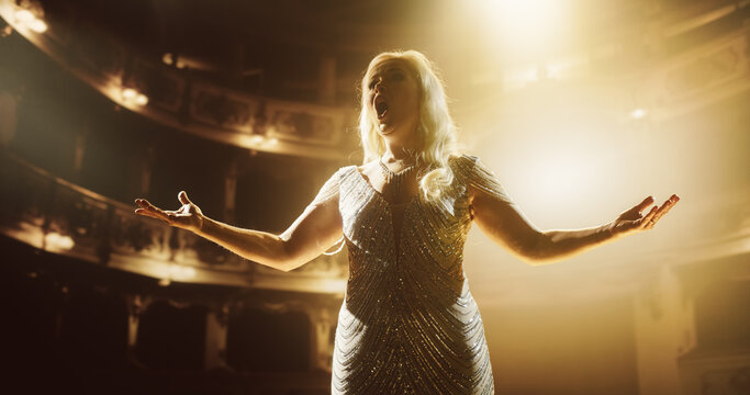 Esteemed Opera Performer Delivering a Soulful Music Performance, Her Voice Soaring Effortlessly Through the Aria. Sophisticated Audience Is Mesmerized by Her Technical Mastery and Emotional Depth
