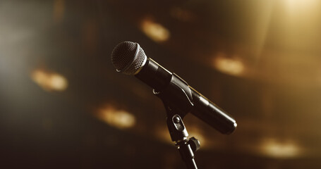 Close Up of a Microphone at a Night Concert. Music Artist Preparing to Take the Stage, Sing Popular Hit Songs to Entertain a Loving Adoring Crowd of Fans and Spectators in the Audience
