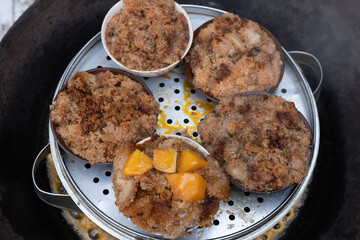 Steamed stuffed tofu in a bamboo basket