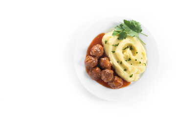 Meatballs with mashed potatoes isolated on white background. Top view. Copy space