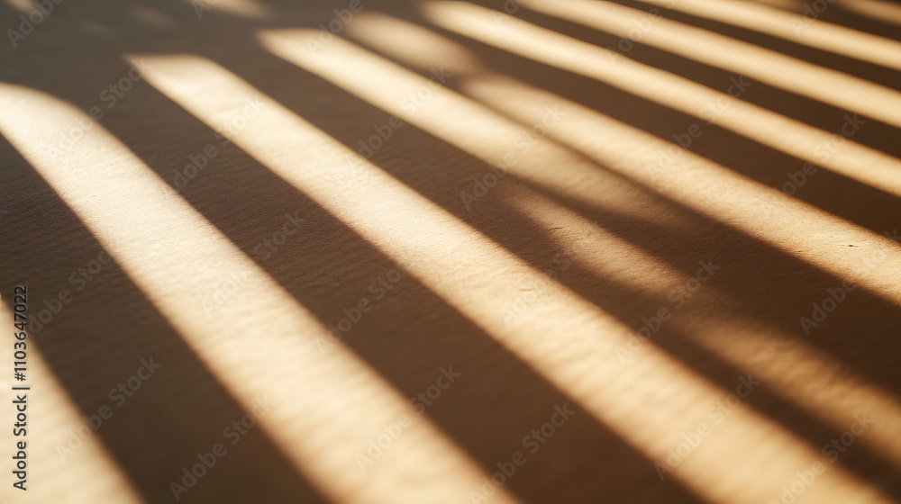 Poster abstract image of parallel light and shadow stripes cast on a beige surface. warm, natural light cre