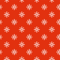 Seamless pattern with white cross-stitched snowflakes on a red background