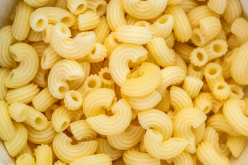 Elbow macaroni texture. Elbow macaroni isolated.  Italian food. 