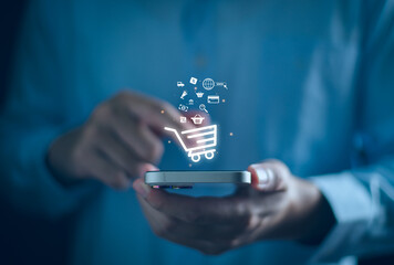 Ecommerce online shop concept. Add to cart internet web store buy online. Businessman using...