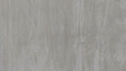 Obraz premium Rough unfinished concrete wall with natural textures and subtle patterns, ideal for use as a background or design element in creative projects.