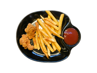 French fries and crispy fried chicken on a black plate. Top view. on transparent background