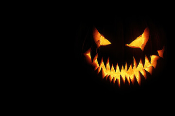 Halloween pumpkin with spooky glowing face