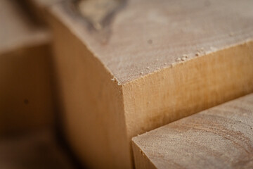 carpentry workshop. Wooden planks at a sawmill or in a carpentry workshop. Sawing and drying of wood.