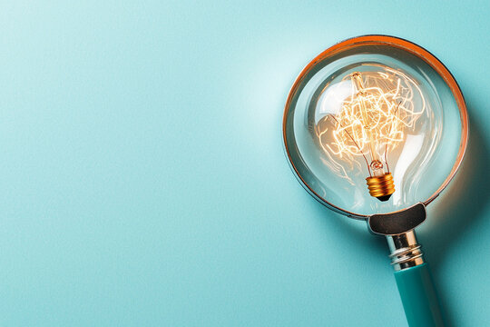 Innovative ai generated light bulb concept modern workspace graphic design minimalist environment top view creative thinking