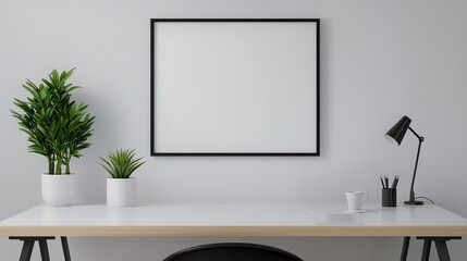 Minimalist workspace with blank frame and potted plants on a white desk, offering a clean modern aesthetic.