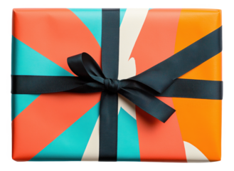 Colorfully wrapped gift with black ribbon bow