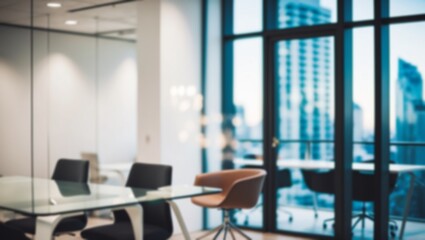 Soft blur  a modern office with workspace and a blurred view of a high-rise city outside the office window.