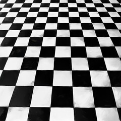 Obraz premium A close-up view of a stylish black and white checkered floor, creating a striking visual effect.