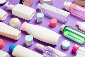 Group of plastic bodycare bottle Flat lay composition with cosmetic products on colored background empty space for you design. Set of White Cosmetic containers, top view with copy space