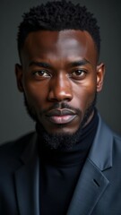 Obraz premium Close-Up Portrait of Confident Man with Dark Skin