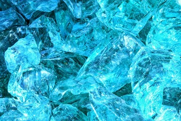 Close-up of pile of shattered blue tones glass. Abstract composition of sharp edges and irregular...