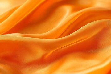 Obraz premium An artistic portrayal of silky fabric draping gently in orange hues.
