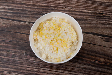 Yellow millet and pearl rice in a small bowl