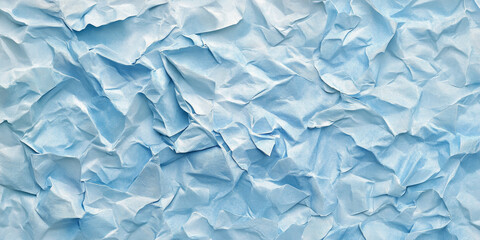 Fototapeta premium Icy blue crumpled paper texture with frosty shades. Subtle folds and creases evoke a cool and textured feel.