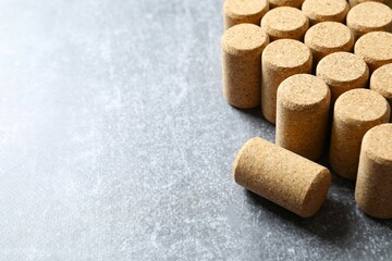 Wine corks on gray background 