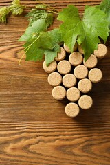 Wine corks in the shape of grapes  on a wooden table