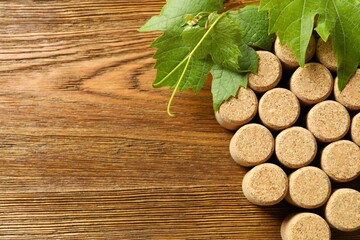 Wine corks in the shape of grapes  on a wooden table