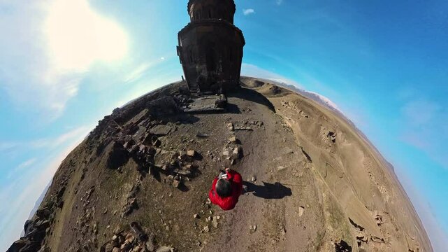 Ani Ancient City, Turkey , Traveler guy making video with 360 camera