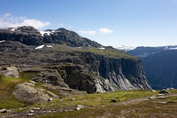 Landscape with trail to Trolltunga, Norway, Ringedalsvatnet lake in background