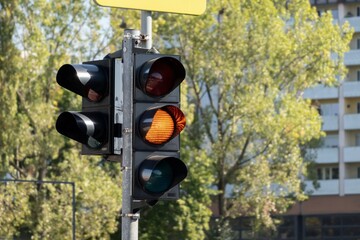 Traffic lights with orange light on, bokeh