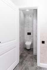 white toilet in a bright interior