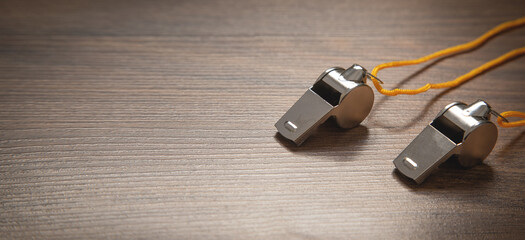 Fototapeta premium Metal whistle of a referee or trainer.