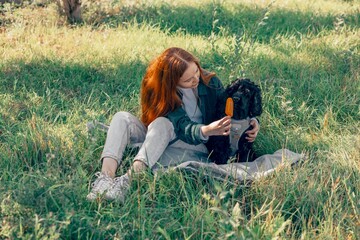 cooling joy of popsicles with pets, summer campaigns more inclusive and fun, red-haired woman, dog...