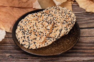 Sesame pretzels on a plate