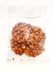 Rempeyek is deep fried cracker snack with peanut, popular in Malaysia and Indonesia