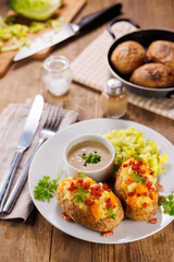 baked potatoes stuffed with cream, cheddar cheese and bacon