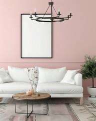 A white sofa with pillows sits in front of a pink wall with a black chandelier and two framed pictures The room is accented with a coffee table and a wooden floor