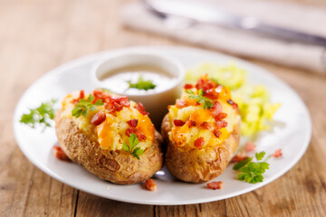 baked potatoes stuffed with cream, cheddar cheese and bacon