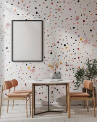 A minimalist dining area with a wooden table and two chairs. a white vase with dried flowers. and an abstract print on the wall The wall has a colorful confetti pattern