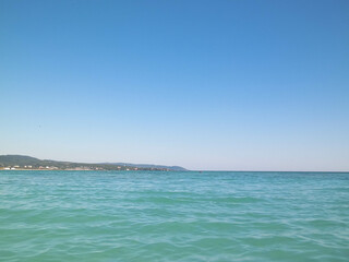Blue water of Tyrrhenian sea in Vada, Tuscany, Italy.