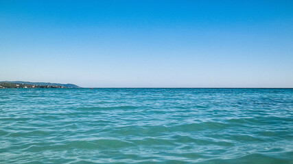 Blue water of Tyrrhenian sea in Vada, Tuscany, Italy.
