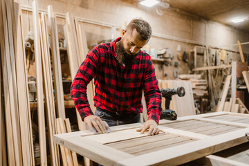 Woodworker Crafting in Workshop