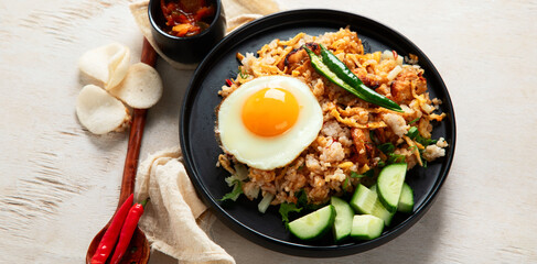 Nasi goreng- Indonesian fried rice with fried egg.