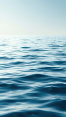 Fototapeta premium Gentle ripples disturb the otherwise glassy surface of the sea , disturbance, surface, ripples, calmness