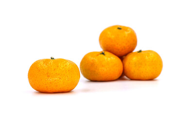 Close up of fresh orange fruit on gray background, selective focus and blank space concept.