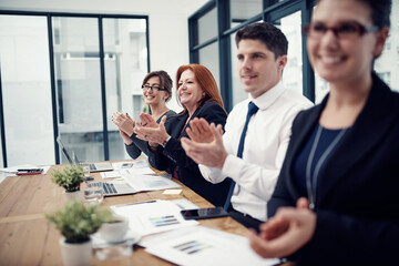 Business people, applause and success in office for goals, happy and profit with meeting at agency. Woman, group and excited with cheers, celebration or achievement in boardroom at insurance company