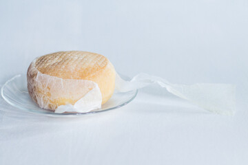 Whole Portuguese amanteigado cheese wheel 