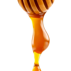 honey dripping from a wooden spoon